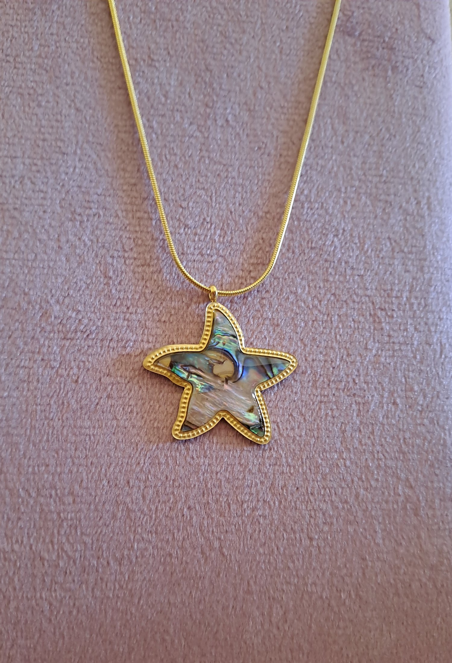 Stella in Madreperla venata gold